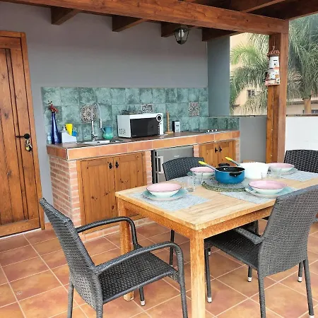 With An Outdoor Kitchen
